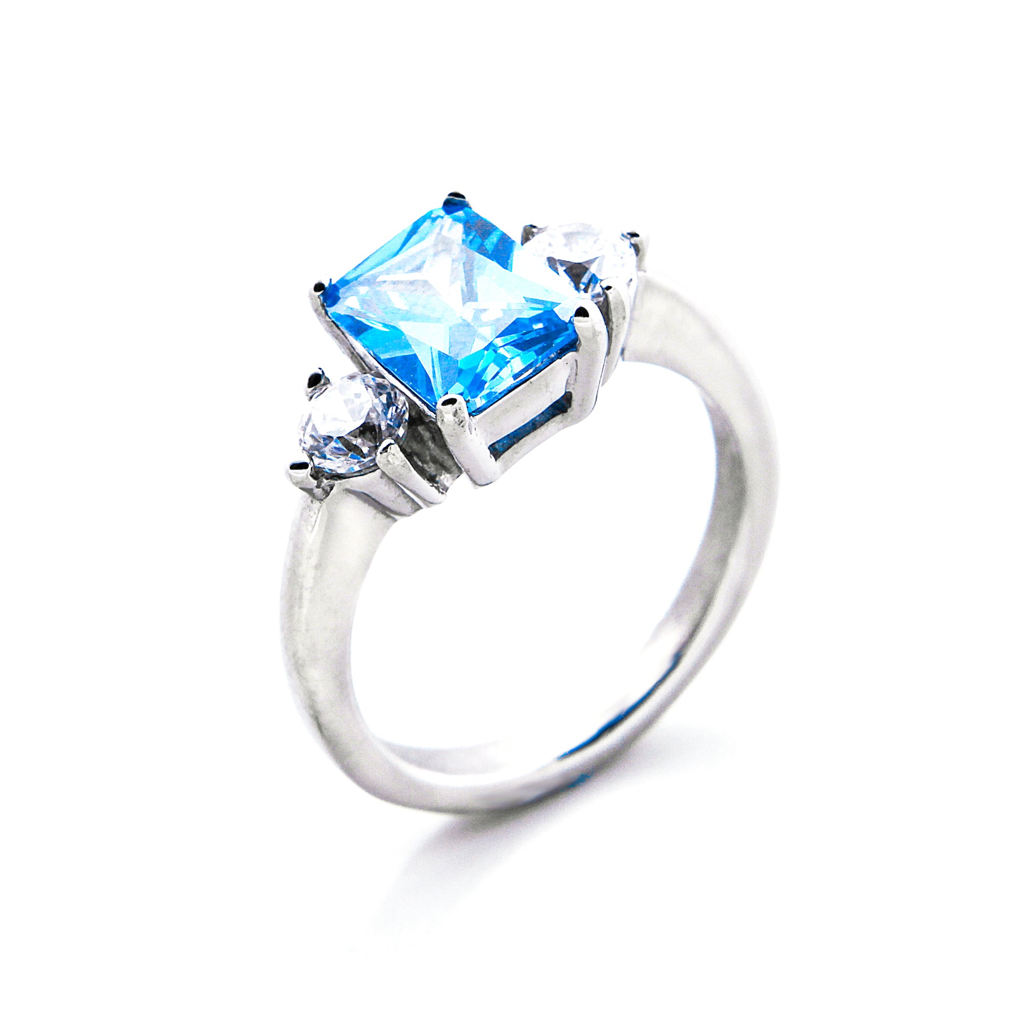 Three Stone Blue Topaz Engagement Ring