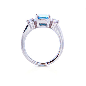Three Stone Blue Topaz Engagement Ring